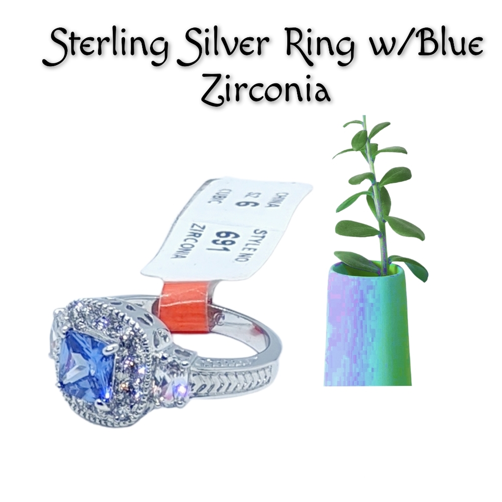 Sterling Silver Ring w/Blue Zirconia. Size 6. NWT.